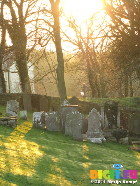 SX17378 Shadows and sunlight on gravestones at St David's Cathedral